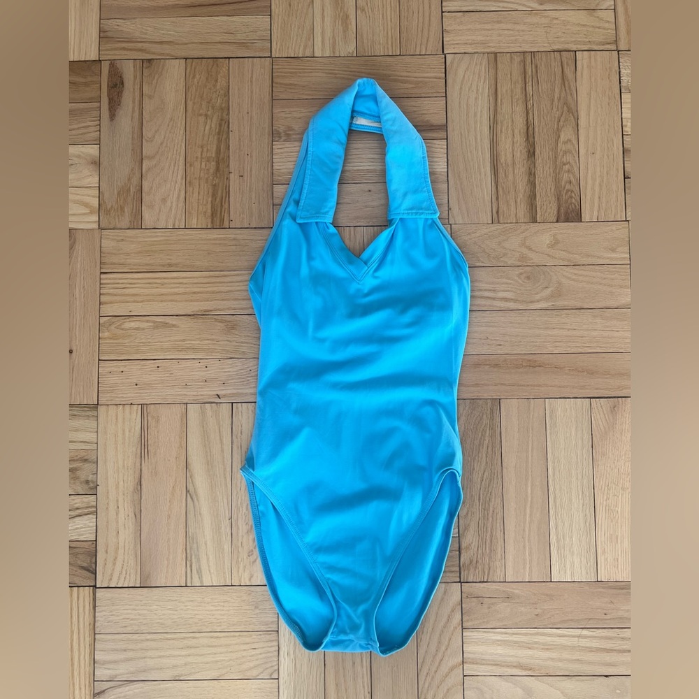 Capezio aqua halter leotard w/ collar detail and shelf bra. Size M. Made in USA.